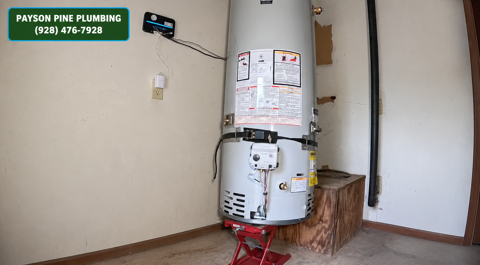Gas water heater installed with seismic straps in a Payson garage
